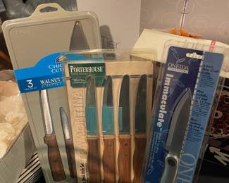 New in package steak knife sets and kitchen knives.