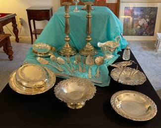 Many beautiful silver plate items.