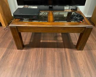 Square coffee table with beveled glass inserts in oak.