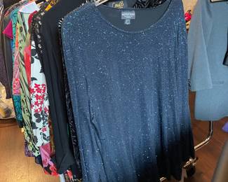 Many gorgeous women’s plus plus sized garments, many new with tags. 