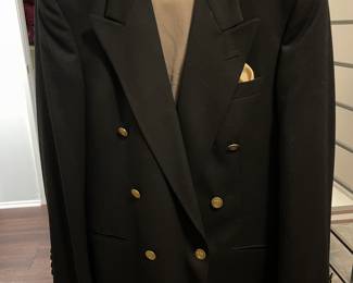 Men’s Christian Dior classic double breasted jacket in navy. This jacket screams ‘class!’ Matching khaki slacks. 