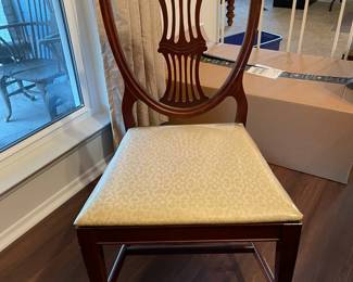 Vintage mahogany Chippendale shield back dining chairs.