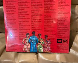 New in wrapper Beatles St. Peppers Lonely Hearts Club Band LP. Unopened copy.