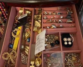 Many vintage pieces of gold and silver jewelry, including vintage watches, rings and earrings. 10K and 14K gold items.
