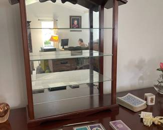 Mahogany table top mirrored curio cabinet with four glass shelves, 