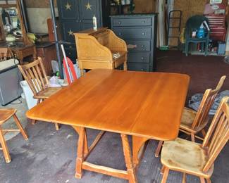 Genuine Cushman maple double rudder drop leaf table and four chairs, stamped and dated