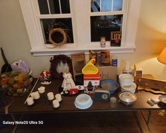 Tupperware, French baking crocks, aluminum bowl/server with lid, vintage laundry decor, vintage Christmas santa, angel, wreath, candelabra, blue tooth am/fm radio speaker, honey pot, plug-in paper lanterns