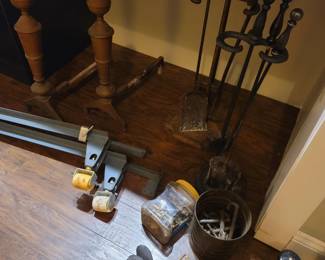 Two metal cast fireplace sets, assorted hardware, pulleys, brackets