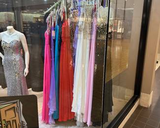 These dresses serve as a PREVIEW of what is to come!  We will be liquidating a bridal/prom/formal wear shop in our NEXT estate sale - February 28.  The dresses brought in for this sale may be purchased.  Trying on the  dresses will not be an option.  However, in the NEXT sale we will have dressing rooms available.  All sales are final and no returns.