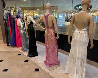 These dresses serve as a PREVIEW of what is to come!  We will be liquidating a bridal/prom/formal wear shop in our NEXT estate sale - February 21.  The dresses brought in for this sale may be purchased.  Trying on the  dresses will not be an option.  However, in the NEXT sale we will have dressing rooms available.  All sales are final and no returns.