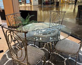 Wrought iron glass patio set