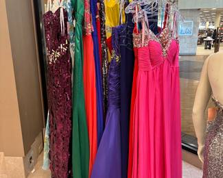 These dresses serve as a PREVIEW of what is to come!  We will be liquidating a bridal/prom/formal wear shop in our NEXT estate sale - February 21.  The dresses brought in for this sale may be purchased.  Trying on the  dresses will not be an option.  However, in the NEXT sale we will have dressing rooms available.  All sales are final and no returns.