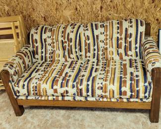 brown patterned loveseat (one of a pair)