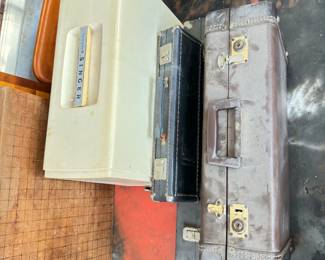 suitcase, singer sewing machine in case