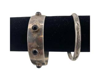 Pair of Sterling Silver and Obsidian Silver Cuffs
