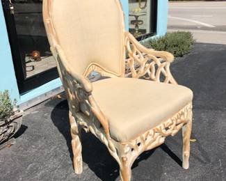 Set of four carved wood "coral" dining room chairs