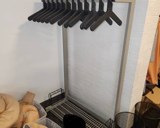 This rack, has holding spaces for umbrellas and is $60 this weekend.