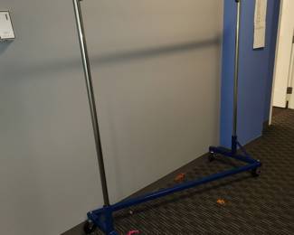 Single pole Z clothing racks: $45.00 each. Top pole is 65" high, rack is 63" long. May be purchased but cannot be removed until 12:00 on SUNDAY.