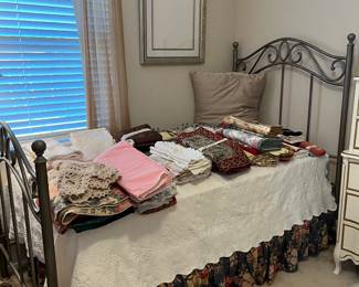 The twin bedroom is where you will find some of the linens in this sale. You will find more of the linens in the garage,