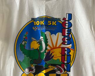 This tee shirt from 2011 is one of many examples of shirts from different marathons. These shirts are in excellent condition.