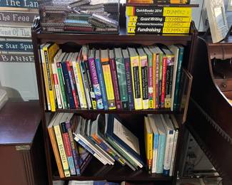 You will find several bookcases in the garage filled with a wide assortment of books. You will find books dealing with religion as well as self-help books. Books dealing with how to write grants and how to navigate the internet.