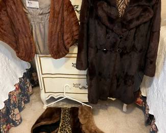 The vintage mink on the left is in excellent condition.