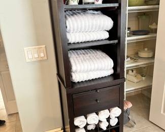 Wine rack can also be used in the bathroom for towels and make up