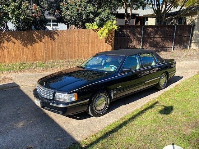 1998 Cadillac Deville  71,000 miles one owner runs great, lived in garage for the last 13 years.  Ready to be the new luxury car in the family.