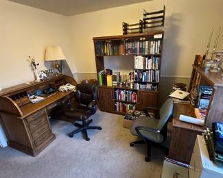 Roll top desk, office chairs, books