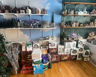 Christmas. D56 on the floor in packages, houses on shelves are not D56