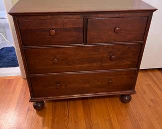Up for pre sale $400
This dresser by Lexington, designed by Bob Timberlake, boasts a stunning cherry wood finish. The dresser features four spacious drawers with wooden handles and sits on elegant bun feet,  Measuring 19.5 inches in length, 38 inches in width, and 36 inches in height 