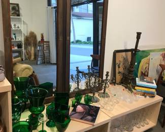 pair of carved mahogany and brass mirrors, green glass, drinking glasses