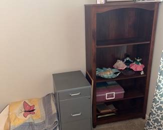 Quilts, craft supplies, filing cabinet, bookshelf