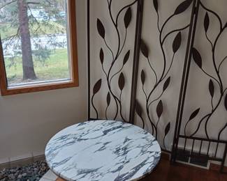 Marble round coffee table available and Metal room separator three sections Sold