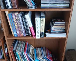 Books on guns travel cars and birds