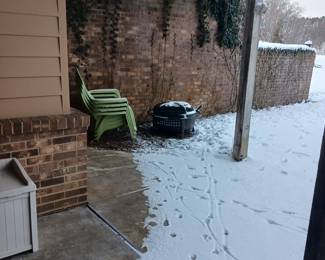 Adirondack plastic chairs. wood burner