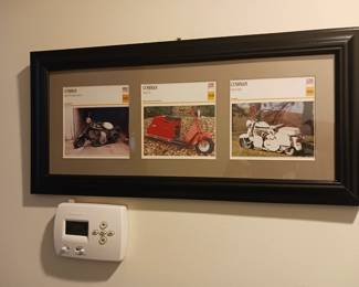 Framed picture of vintage Cushman scooters