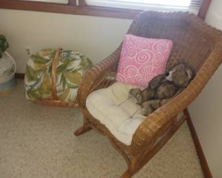 Brown wicker rocking chair