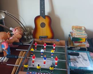 Child size foosball soccer game, ukulele