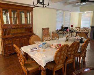 Beautiful real wood dining room table and chairs (with padded seats) with extra leaf extension (not pictured with extension), 2-piece wood hutch with wine rack and glass holder