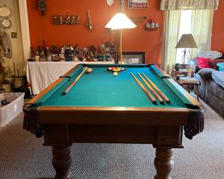Regulation size pool table and accessories. 