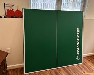 Ping Pong table with paddles and balls. This does not have legs and meant to be on a pool table or other type of game table. 