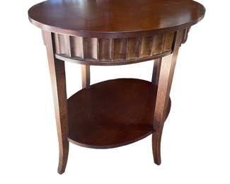 $250 USD       2 Shelf Fluted Wood Oval Pedestal End Table MD219-1     Description: Introducing the 2 Shelf Wood Oval Pedestal End Table, the perfect addition to any living space. With two shelves for storage and an elegant oval pedestal design, this table is both functional and stylish. Crafted from high-quality wood, it is durable and long-lasting. Complete your room with this must-have piece today. 

Dimensions: 32 x 25 x 29"H

Condition: Good Condition

Local pick up Bethesda, MD.  Contact us for shipper suggestions.      https://goodbyhello.com/products/wood-oval-end-table-d219-1?_pos=24&_sid=c42f9c946&_ss=r