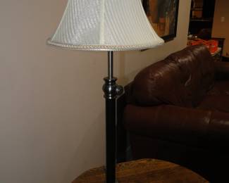 Tall slender, metal table lamp