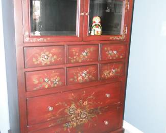 Asian inspired cabinet with wonderful glass doors to showcase all your items