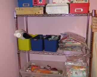 We have lots and lots and lots of sewing items, and craft items for sale, along with the metal rack too