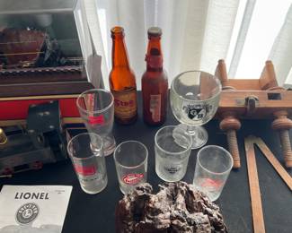 BEER GLASSES AND BOTTLES.  
