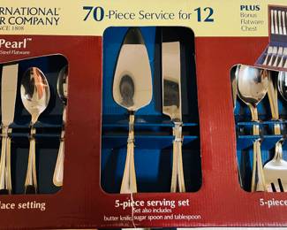 International Silver Company 70 Pc 
Service for (12)  "Golden Pearl"
Gold Accent Stainless Steel Flatware 