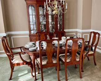 Henkel Harris table, chairs and breakfront.  Table has three leaves.