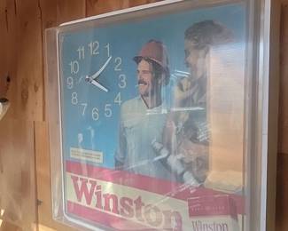 Does Light Up But has Crack In Plastic Where The Hands Are Hands Don't Move. 